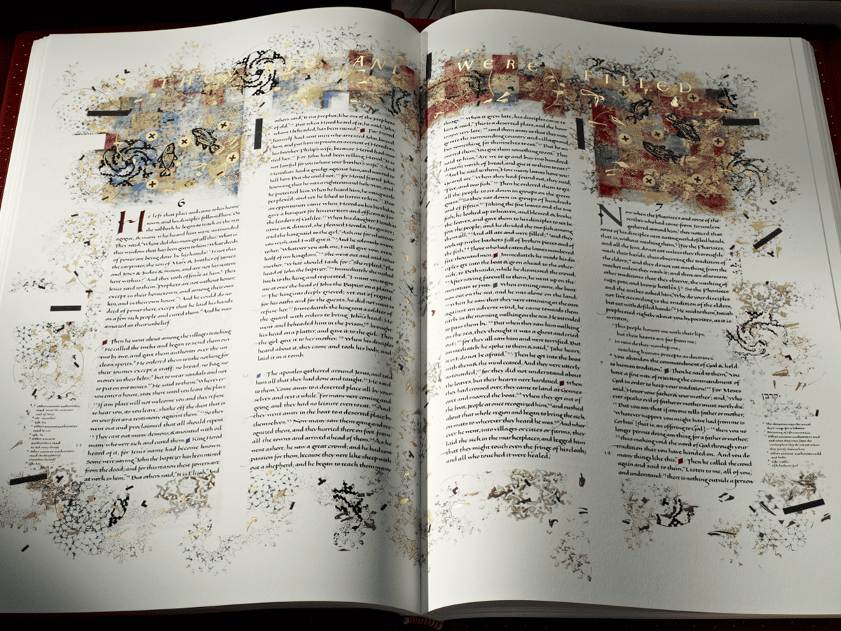 A detailed, colorful artistic depiction of an open book with abstract paint splashes and decorative elements, representing creativity and knowledge at Incarnation Lutheran Church.